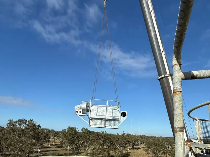 Craning a new dust collector unit into position